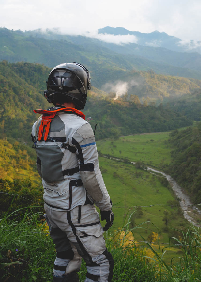 Adv rider overlooking a river in Colombia.