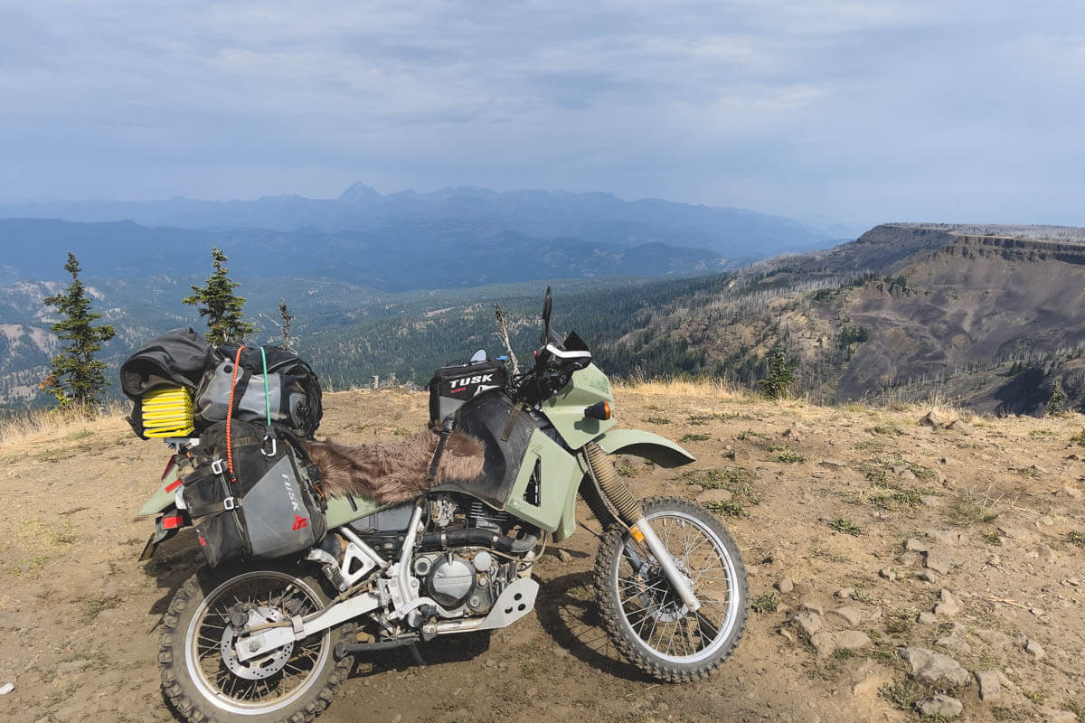 My motorcycle with Lion Rock in the background on the Washington Backcountry Discovery Route